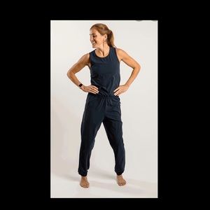 Body suit with pockets